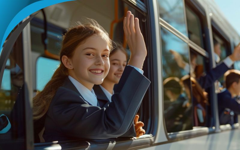 students waving from inside the bus, school travel, June 2024, Australia